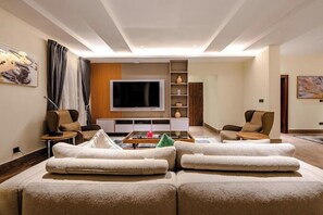 Economy-Apartment, Balkon, Stadtblick | Wohnbereich