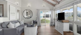 Beach Retreat w/ Sundeck, Golf Cart & Bikes Bungalow House by Avantstay