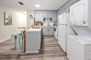 Fridge, coffee/tea maker, cookware/dishes/utensils