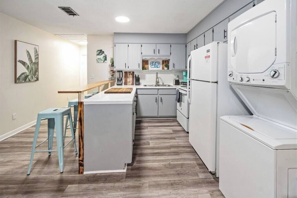 Fridge, coffee/tea maker, cookware/dishes/utensils