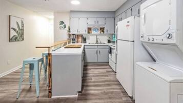 Fridge, coffee/tea maker, cookware/dishes/utensils