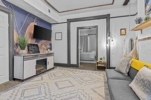 TV, fireplace, books, offices