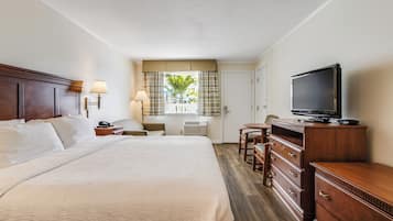 Deluxe Room, 1 King Bed with Sofa bed, Pool View | Bathroom | Combined shower/tub, hair dryer, towels, soap