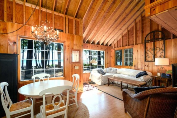 TV, fireplace, books - Private Dock, Boat Access & Sunrise Views (Meredith)