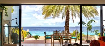 Beach house is located on the crystal clear Caribbean Sea.