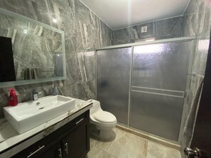 Shower, towels, soap, shampoo