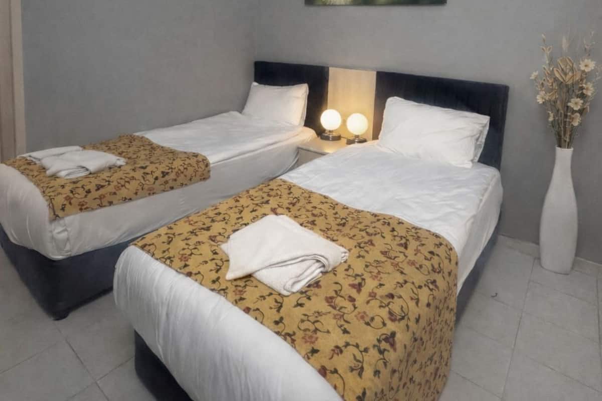 Ropa de cama de alta calidad y minibar