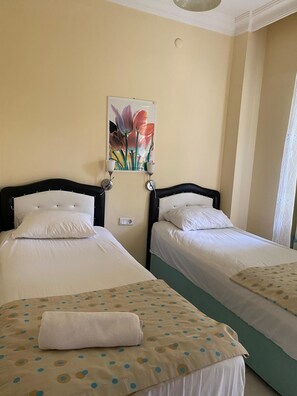 Premium bedding, laptop workspace, free WiFi, bed sheets