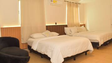 Habitación Premier con 2 camas individuales | Escritorio, wifi gratis y ropa de cama