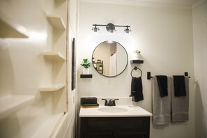 Shower, towels, toilet paper