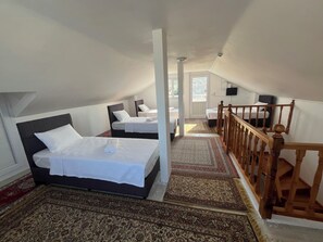 4 slaapkamers, een strijkplank/strijkijzer, gratis wifi, beddengoed