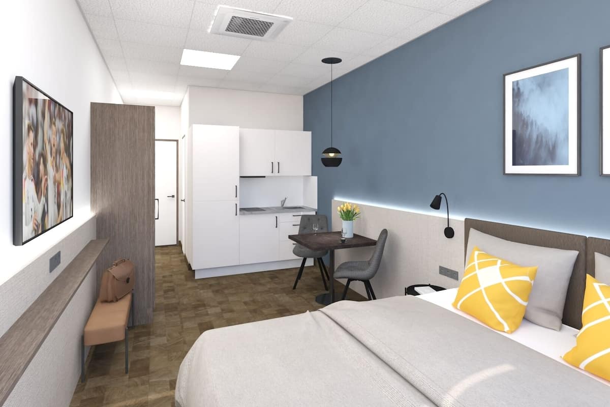 Habitación estándar, 1 cama King size | Minibar, espacio para trabajar con laptop y cortinas blackout
