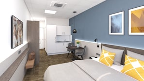 Minibar, espacio para trabajar con laptop y cortinas blackout