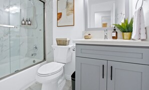 Hair dryer, towels, soap, shampoo