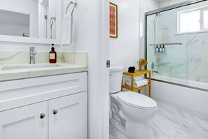 Hair dryer, towels, soap, shampoo