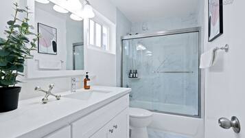 Hair dryer, towels, soap, shampoo