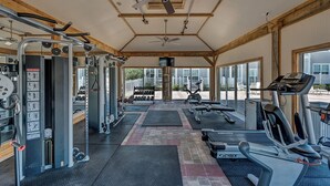A gym with treadmills, elliptical machines, and weightlifting equipment. - 3br/2ba, Sleeps 6, BBQ Grill, Pool, Beach Access + Free Attraction Tickets! (Santa Rosa Beach)