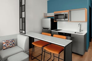 Full-size fridge, microwave, ice maker