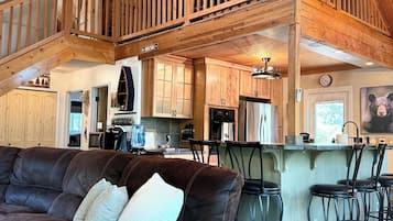 Smart TV, fireplace, books, stereo