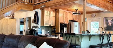 Smart TV, fireplace, books, stereo