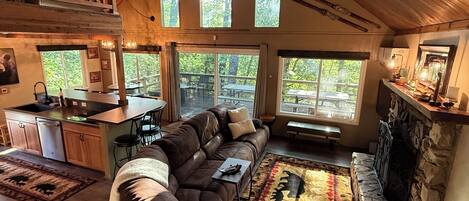 Smart TV, fireplace, books, stereo