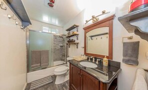 Hair dryer, towels, soap, shampoo