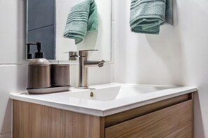 Hair dryer, towels, soap, toilet paper