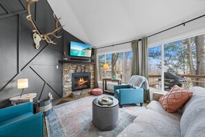 TV, fireplace, books - Charming Beech Mtn Home w/ Hot Tub, Fire Table, Pet-Friendly & Private Deck (Beech Mountain)