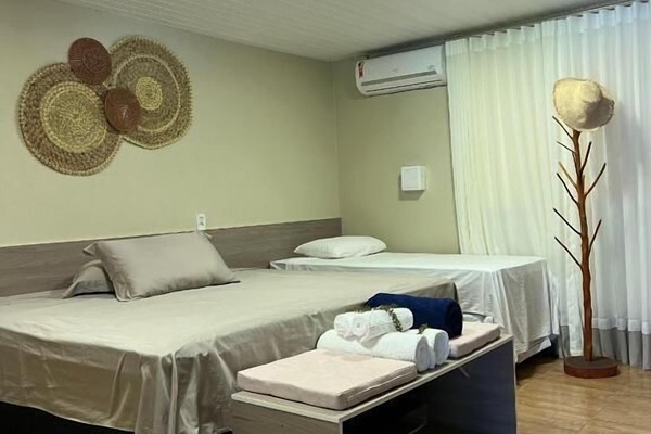 Chambre Deluxe, vue sur la plage | Coffre-fort, espace de travail pour ordinateurs portables