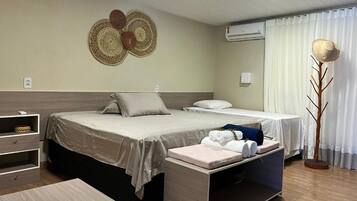 Deluxe Room, Beach View | In-room safe, laptop workspace, WiFi (free), individually decorated