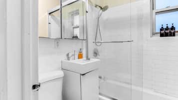 Hair dryer, towels, soap, shampoo
