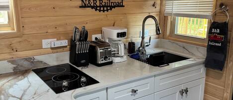 Fridge, microwave, stovetop, coffee/tea maker