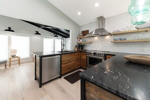 Fridge, microwave, oven, stovetop - Hobbs Realty - Waterfront living at The Minnow, a charming 2 bedroom with a day dock! (Holden Beach)