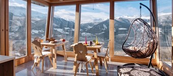 Camera 'Mairhof Acht Gipfel' con vista sulle montagne, terrazza privata e giardino in comune