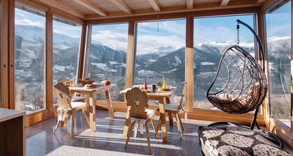 Chambre 'Mairhof Stilfser Joch Zi 6' avec vue sur les montagnes, terrasse privée et jardin partagé