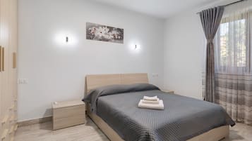 1 dormitori, planxa i posts de planxar, wifi gratuïta i roba de llit