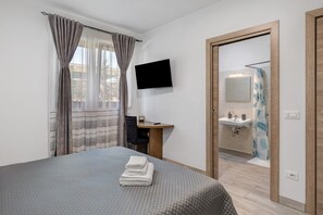 1 habitación, tabla de planchar con plancha, wifi gratis y ropa de cama 