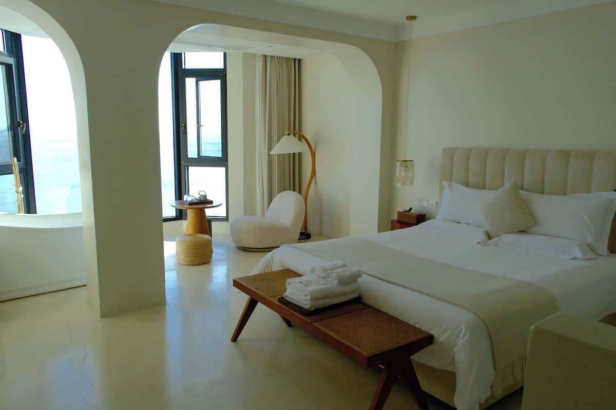 Hochwertige Bettwaren, kostenlose Minibar, Verdunkelungsvorhänge