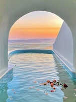 Seasonal outdoor pool, open 6:00 AM to 9:00 PM, pool umbrellas