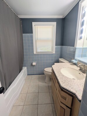 Hair dryer, towels, soap, shampoo