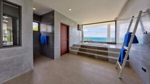 A modern bathroom with a large window, a shower area, and a view of the sea. - Staylar Luxury Seaview Pool Villa Maeva, Koh Samui (Koh Samui, Chaweng Noi)