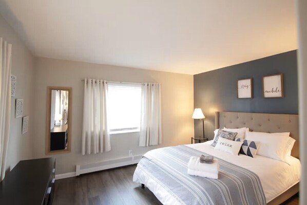 1 bedroom, desk, iron/ironing board, travel crib