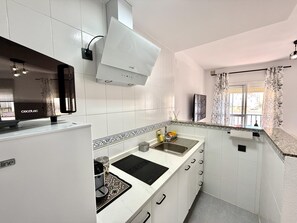 Fridge, microwave, oven, coffee/tea maker