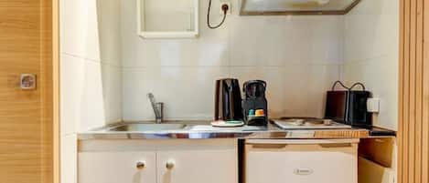 Fridge, microwave, coffee/tea maker, toaster