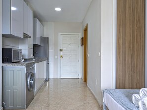 Fridge, microwave, coffee/tea maker, toaster