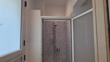Hair dryer, bidet, towels, soap