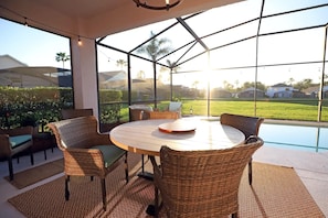 Outdoor dining - Enchanted Villa with Lake View 6-Bedroom in Resort 9 miles to Disney World 15 miles to the Wizarding World of Harry Potter (Kissimmee)