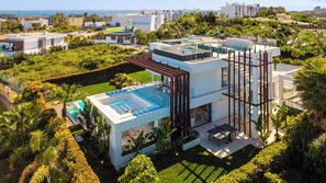 Enjoy a panoramic view of the surrounding landscape and sea from the rooftop terrace with a swimming pool.