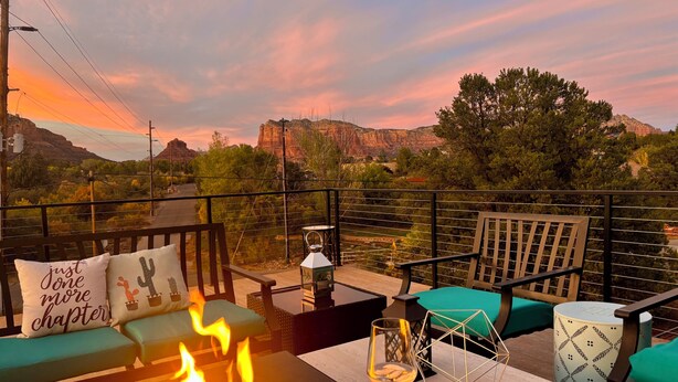A terrace with a fire pit, seating, and a view of the mountains. - 2 King Ensuites Elevated Views Spa Amenities at Sedona Sky (Sedona)