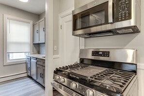 Fridge, stovetop, coffee/tea maker, cookware/dishes/utensils - 1 Mi to Dtwn: Pet-Friendly Providence Apt w/ Yard (Providence)